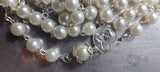 Beautiful one of a kind pearl and vintage silver wedding rosary with a stunning vintage silver ornate Pardon Crucifix. Kim Williams Patenôtrier Rosaries, The Village Artist, Proudly South African, handmade. Catholic Store South African.