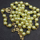 Mater Dolorosa Our Lady of Sorrows Loreta Crucifix vintage pearl rosary, the village artist, Kim Williams rosaries