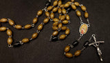 Beautiful natural wooden Guadalupe Rosary with a 4D Papal Crucifix. Kim Williams Rosaries. The Village Artist.