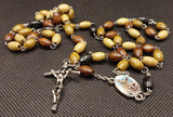 Beautiful natural shades of wooden beads St Michael Rosary with 4D Papal Crucifix. Kim Williams Rosaries. The Village Artist