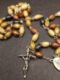 Beautiful natural shades of wooden beads St Michael Rosary with 4D Papal Crucifix. Kim Williams Rosaries. The Village Artist