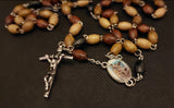 Beautiful natural shades of wooden beads St Michael Rosary with 4D Papal Crucifix. Kim Williams Rosaries. The Village Artist