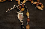Beautiful natural shades of wooden beads St Michael Rosary with 4D Papal Crucifix. Kim Williams Rosaries. The Village Artist