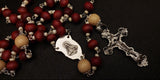 An exquisite Virgin Mary Praying Holy Heirloom Rosary with elegant ornate vintage silver fleur de lis Crucifix made by Kim Williams Rosaries for The Village Artist.