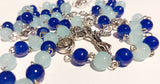 Pope John Paull II Papal crucifix handmade rosary, sapphire and ice blue glass beads, vintage metal roses, Madonna and child center piece, the village artist, one-of-a-kind handmade rosaries, Patenôtrier,  South African artist and jeweler.