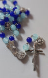 Pope John Paull II Papal crucifix handmade rosary, sapphire and ice blue glass beads, vintage metal roses, Madonna and child center piece, the village artist, one-of-a-kind handmade rosaries, Patenôtrier,  South African artist and jeweler.