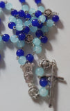 Pope John Paull II Papal crucifix handmade rosary, sapphire and ice blue glass beads, vintage metal roses, Madonna and child center piece, the village artist, one-of-a-kind handmade rosaries, Patenôtrier,  South African artist and jeweler.