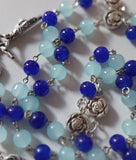 Pope John Paull II Papal crucifix handmade rosary, sapphire and ice blue glass beads, vintage metal roses, Madonna and child center piece, the village artist, one-of-a-kind handmade rosaries, Patenôtrier,  South African artist and jeweler.