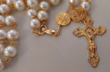 Beautiful one of a kind ivory pearl beads with gold filigree bead caps. Gold disc shaped St benedict beads. Detailed Loretta fleur de Lis gold crucifix. Kim Williams Patenôtrier Rosaries, The Village Artist, Proudly South African, handmade. Catholic Store South African.