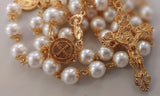 Beautiful one of a kind ivory pearl beads with gold filigree bead caps. Gold disc shaped St benedict beads. Detailed Loretta fleur de Lis gold crucifix. Kim Williams Patenôtrier Rosaries, The Village Artist, Proudly South African, handmade. Catholic Store South African.