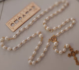 Beautiful one of a kind ivory pearl beads with gold Our Lady of Sorrows Mater Dolorosa  center piece and detailed Loretta fleur de Lis gold crucifix. Kim Williams Patenôtrier Rosaries, The Village Artist, Proudly South African, handmade. Catholic Store South African.