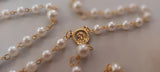 Beautiful one of a kind ivory pearl beads with gold Our Lady of Sorrows Mater Dolorosa  center piece and detailed Loretta fleur de Lis gold crucifix. Kim Williams Patenôtrier Rosaries, The Village Artist, Proudly South African, handmade. Catholic Store South African.