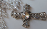 Beautifully detailed one of a kind high quality Swarovski crystal beads, sliver wedding Rosary with stunningly detailed Praying Mary center piece, filigree ornate cross with imbedded diamante wedding rosary. Kim Williams Patenôtrier Rosaries, The Village Artist, Proudly South African, handmade. Catholic Store South African.