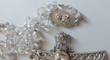 Beautifully detailed one of a kind high quality Swarovski crystal beads, sliver wedding Rosary with stunningly detailed Praying Mary center piece, filigree ornate cross with imbedded diamante wedding rosary. Kim Williams Patenôtrier Rosaries, The Village Artist, Proudly South African, handmade. Catholic Store South African.