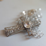 Beautifully detailed one of a kind high quality Swarovski crystal beads, sliver wedding Rosary with stunningly detailed Praying Mary center piece, filigree ornate cross with imbedded diamante wedding rosary. Kim Williams Patenôtrier Rosaries, The Village Artist, Proudly South African, handmade. Catholic Store South African.