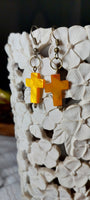 Yello seashell cross faith earrings