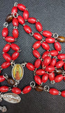 Beautiful red wooden Guadalupe center piece, Medjugorje ornate Crucifix and vintage silver Our Lady of Guadalupe medallion. Kim Williams Rosaries, the Village Artist.