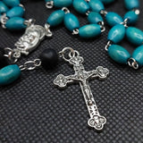 Beautiful detailed Medjugorje turquoise blue wooden and black glass Madonna and Child Sacred Heart Rosary. Kim Williams Rosaries. The Village artist.