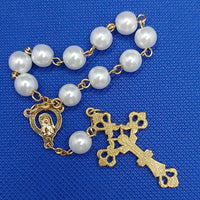 Beautiful Gold Catholic Baptism Rosary. 1 decade. 11 smooth round glass faux pearl vintage ivory white beads. Gold links and chains. Ornate detailed Loretta crucifix. Our Lady with crown of 12 stars center piece in front on the back Sacred Heart in gold. Kim Williams Rosaries. The Village Artist. 