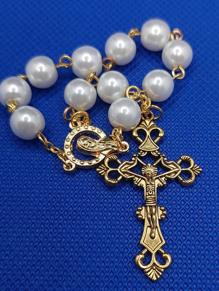 Beautiful Gold Catholic Baptism Rosary. 1 decade. 11 smooth round glass faux pearl vintage ivory white beads. Gold links and chains. Ornate detailed Loretta crucifix. Our Lady with crown of 12 stars center piece in front on the back Sacred Heart in gold. Kim Williams Rosaries. The Village Artist. 