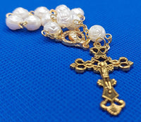 Beautiful Gold Catholic Baptism Rosary. 1 decade. 11  round acrylic faux pearl vintage ivory white rose shaped beads. Gold links and chains. Ornate detailed Loretta crucifix. Our Lady with crown of 12 stars center piece in front on the back Sacred Heart in gold. Kim Williams Rosaries. The Village Artist.
