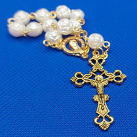 Beautiful Gold Catholic Baptism Rosary. 1 decade. 11  round acrylic faux pearl vintage ivory white rose shaped beads. Gold links and chains. Ornate detailed Loretta crucifix. Our Lady with crown of 12 stars center piece in front on the back Sacred Heart in gold. Kim Williams Rosaries. The Village Artist.