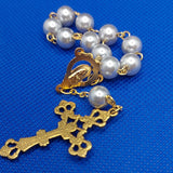 Beautiful Gold Catholic Baptism Rosary. 1 decade. 11 smooth round glass faux vintage silver pearl beads. Gold links and chains. Ornate detailed Loretta crucifix. Our Lady of 12 stars crown with Sacred Heart in gold on the back. Kim Williams Rosaries. The Village Artist. 