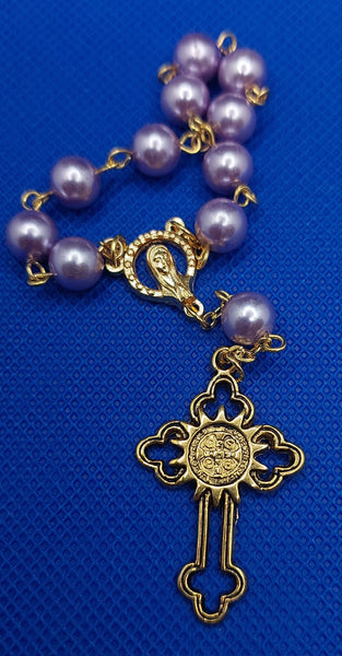 Beautiful Gold Catholic Baptism Rosary. 1 decade. 11 smooth round glass faux pearl vintage lilac beads. Gold links and chains. Ornate detailed St Benedict crucifix. Oor Lady crowned with 12 stars center piece in front on the back Sacred Heart of Jesus in gold. Kim Williams Rosaries l. The Village Artist. 