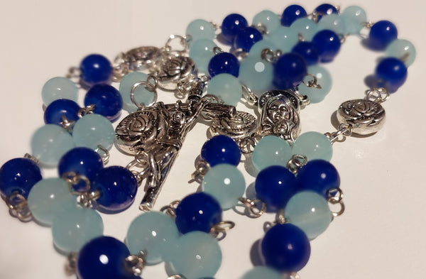 Pope John Paull II Papal crucifix handmade rosary, sapphire and ice blue glass beads, vintage metal roses, Madonna and child center piece, the village artist, one-of-a-kind handmade rosaries, Patenôtrier,  South African artist and jeweler.